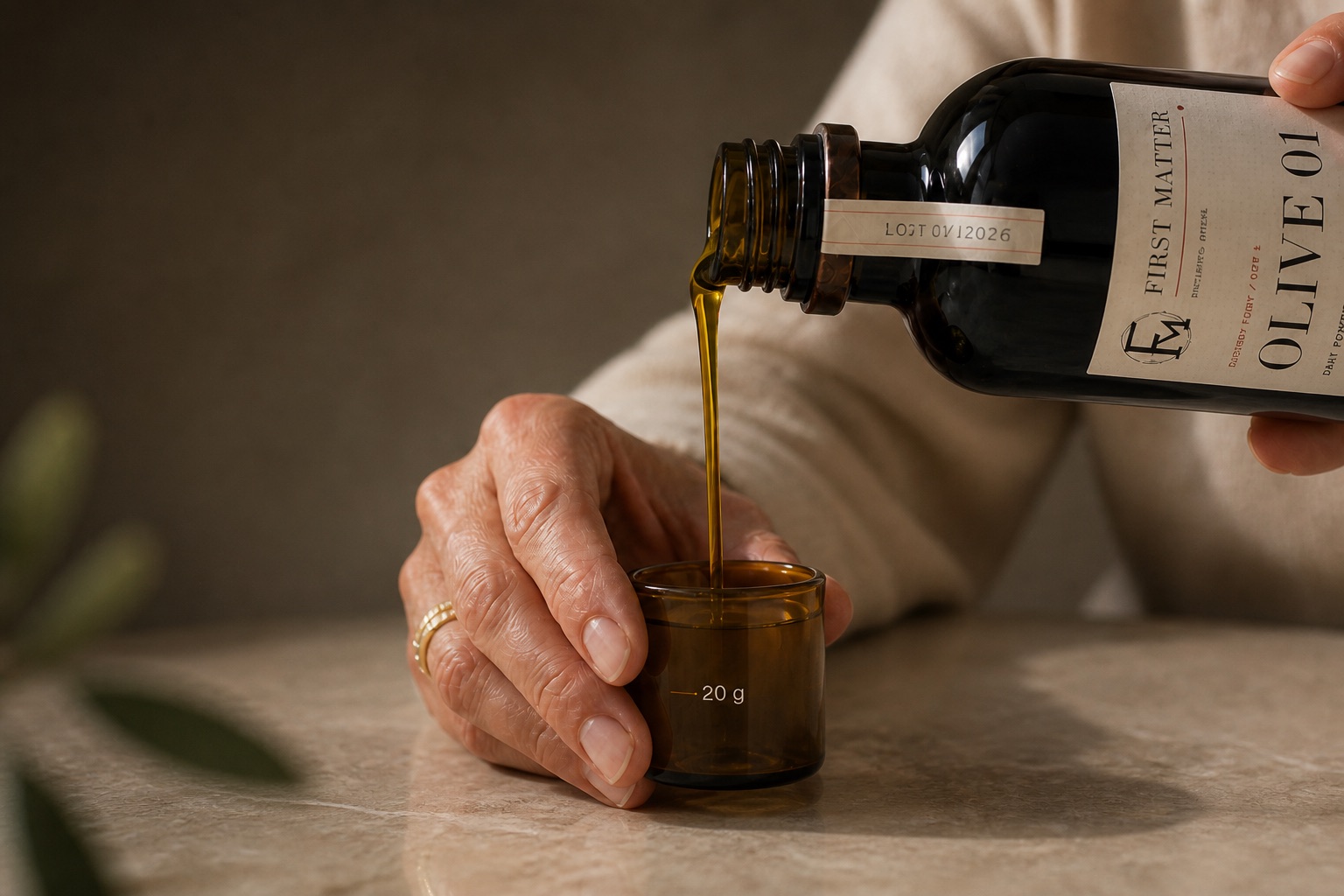 Freshly produced olive oil flowing at the mill